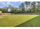 Expansive backyard with lush green grass and a privacy fence, perfect for outdoor activities at 165 Clydesdale Cir, Summerville, SC 29486