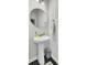 Cozy half bathroom features pedestal sink, vanity mirror, and brushed nickel accessories at 165 Clydesdale Cir, Summerville, SC 29486