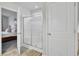 Bathroom featuring tile floors, a glass door shower, and access to main bedroom at 165 Clydesdale Cir, Summerville, SC 29486