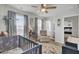 Comfortable Bedroom with a chair, a soft rug, a crib, and plenty of natural light at 165 Clydesdale Cir, Summerville, SC 29486
