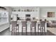 Well-lit kitchen featuring white cabinets, granite counters, and stainless steel appliances at 165 Clydesdale Cir, Summerville, SC 29486