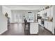 Well-equipped kitchen featuring white cabinets, granite counters, and a breakfast bar at 165 Clydesdale Cir, Summerville, SC 29486