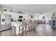 Open concept kitchen with white cabinets, granite counters, and stainless steel appliances at 165 Clydesdale Cir, Summerville, SC 29486