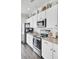 Modern kitchen with stainless steel appliances, granite countertops, and white cabinets at 165 Clydesdale Cir, Summerville, SC 29486