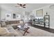 Spacious living room featuring neutral decor, lots of natural light, and hardwood floors at 165 Clydesdale Cir, Summerville, SC 29486