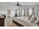 Large main bedroom with carpet, ceiling fan, and a view to another room at 165 Clydesdale Cir, Summerville, SC 29486