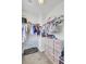 Well-organized walk-in closet with shelves, rods, and storage bins for optimal organization at 165 Clydesdale Cir, Summerville, SC 29486