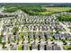 Wide aerial view of a residential neighborhood with many single Gathering homes, manicured lawns, and mature trees at 1722 Winfield Way, Charleston, SC 29414