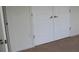 Bedroom entrance showing white doors and neutral carpet at 1755 Central Park Rd # 9103, Charleston, SC 29412
