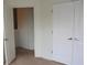 Bedroom entrance, showing doors and neutral carpet at 1755 Central Park Rd # 9103, Charleston, SC 29412