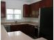 Bright kitchen with granite countertops, stainless steel appliances, and a breakfast bar at 1755 Central Park Rd # 9103, Charleston, SC 29412