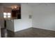 Open-concept living room featuring wood floors and neutral walls at 1755 Central Park Rd # 9103, Charleston, SC 29412