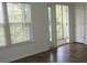 Living room with a window and door to balcony with natural light at 1755 Central Park Rd # 9103, Charleston, SC 29412