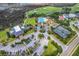 Wonderful aerial view of a community, pool, golf course, tennis court and parking lot at 1868 Palmetto Isle Dr, Mount Pleasant, SC 29466
