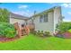 Backyard featuring a wooden deck, manicured lawn, and lush landscaping at 1868 Palmetto Isle Dr, Mount Pleasant, SC 29466