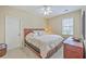 Bedroom with a queen bed, neutral walls, and carpeted floors at 1868 Palmetto Isle Dr, Mount Pleasant, SC 29466