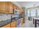Kitchen with stainless steel appliances, granite countertops and a windowed breakfast nook at 1868 Palmetto Isle Dr, Mount Pleasant, SC 29466