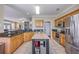 Open kitchen featuring granite countertops, stainless steel appliances and center island at 1868 Palmetto Isle Dr, Mount Pleasant, SC 29466