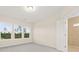 Bedroom boasts natural light from three windows and ensuite bathroom at 198 Winding Branch Dr, Summerville, SC 29486
