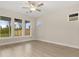 Bright bedroom with large windows that look out to the backyard at 198 Winding Branch Dr, Summerville, SC 29486