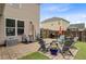 Backyard patio with outdoor seating area and fire pit, perfect for entertaining guests at 199 Meadow Wood Rd, Summerville, SC 29486