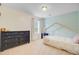 Bright bedroom with a large black dresser and a white, house-frame bed, filled with natural light at 199 Meadow Wood Rd, Summerville, SC 29486