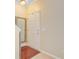 Bright entryway with hardwood floors, a white door, and a mirror on the wall at 199 Meadow Wood Rd, Summerville, SC 29486