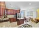 Updated kitchen featuring granite countertops, stainless steel appliances, and a cozy dining space at 199 Meadow Wood Rd, Summerville, SC 29486