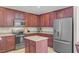 Modern kitchen featuring granite countertops, stainless steel appliances, and an island at 199 Meadow Wood Rd, Summerville, SC 29486
