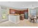 Charming kitchen featuring granite countertops, stainless steel appliances, and an adjacent dining area at 199 Meadow Wood Rd, Summerville, SC 29486