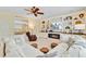 Comfortable living room with a fireplace, built-in shelving, and comfortable seating at 199 Meadow Wood Rd, Summerville, SC 29486