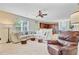 Spacious living room open to kitchen featuring plush seating and ample natural light at 199 Meadow Wood Rd, Summerville, SC 29486