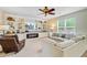 Cozy living room featuring built-in shelving, a fireplace, and comfortable seating at 199 Meadow Wood Rd, Summerville, SC 29486