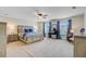 This spacious main bedroom features a ceiling fan, large windows, and elegant furnishings with blue accents at 199 Meadow Wood Rd, Summerville, SC 29486