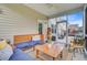 Inviting screened-in patio with comfortable seating and stylish decor, creating a perfect outdoor retreat at 199 Meadow Wood Rd, Summerville, SC 29486