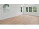Spacious bedroom with ample natural light and hardwood floors at 2006 Riverbend Dr, Charleston, SC 29412