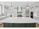 Spacious kitchen featuring a large island, stainless steel appliances, and custom cabinetry at 2006 Riverbend Dr, Charleston, SC 29412