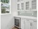 Kitchen with stainless steel wine cooler and ample storage at 2006 Riverbend Dr, Charleston, SC 29412