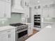 Well-equipped kitchen with stainless steel appliances, custom cabinets, and stone countertops at 2006 Riverbend Dr, Charleston, SC 29412