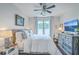 Serene bedroom features a comfortable bed, soft lighting, and a calming atmosphere at 21 George St # 203, Charleston, SC 29401