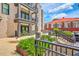 A cozy exterior courtyard with patio seating and lush greenery at 21 George St # 203, Charleston, SC 29401