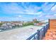 Scenic roof deck featuring panoramic city views and ample room for entertaining at 21 George St # 203, Charleston, SC 29401