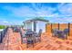 Relaxing rooftop deck with ample seating and stunning panoramic views at 21 George St # 203, Charleston, SC 29401