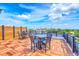 Outdoor rooftop deck furnished with multiple seating areas providing stunning city views and a relaxing ambiance at 21 George St # 203, Charleston, SC 29401
