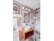 Modern bathroom with a glass shower, unique vanity, modern lighting, and stylish tile at 22 Charlestowne Rd, Charleston, SC 29407