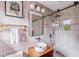 Modern bathroom with sleek vanity, frameless shower, and stylish fixtures, designed for a contemporary look and feel at 22 Charlestowne Rd, Charleston, SC 29407