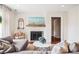 Bright living room featuring a fireplace, comfortable seating, and warm accents at 22 Charlestowne Rd, Charleston, SC 29407
