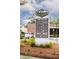 Directory sign of South Windermere Center with shops and restaurants under a partly cloudy sky at 22 Charlestowne Rd, Charleston, SC 29407