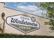 Sign on brick building for South Windermere Center with logo and establishment year at 22 Charlestowne Rd, Charleston, SC 29407