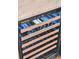 Close-up view of a modern wine cooler with wooden racks, showcasing the sophisticated storage solution at 22 Charlestowne Rd, Charleston, SC 29407